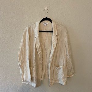 Beige blazer with black stripes